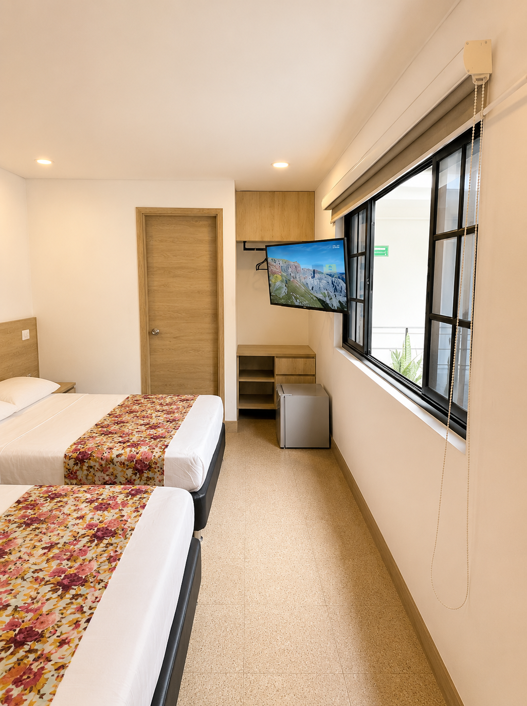 Habitación Triple / Familiar — dos camas amplias
